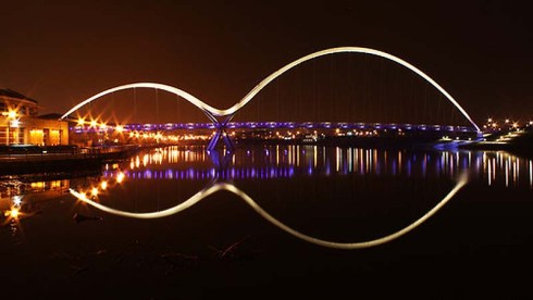 Infinity Bridge in Stockton-on-Tees, UK designed by Expedition Engineering and interactive lighting by Speirs and Majors. 