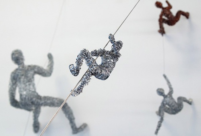Contemporary wire sculpture, Chris Mason, social climbing and rewired, hanging sculptures made of wire